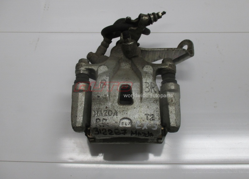 Суппорт Задний Правый CX 5 2012>